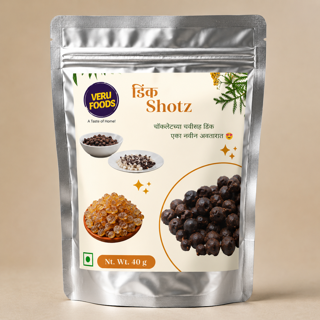 Silver foil stand-up pouch of Dink Shotz featuring chocolate-coated edible tree sap bites made with desi ghee