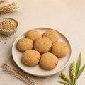 Homemade jowar cookies made with sorghum flour, with jowar grains and natural elements.