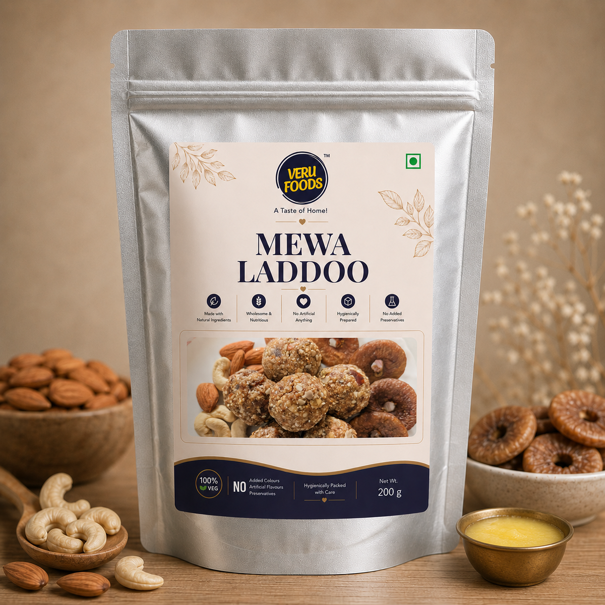 Premium Veru Foods Mewa Laddoo 200g in silver stand-up pouch packaging with almonds, cashews, dried figs, and ghee bowl on wooden surface, showcasing natural ingredients and hygienic preparation