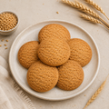 Veru Foods Wheat Cookies made with wheat flour, featuring five golden-brown crumbly cookies arranged on a ceramic plate with wheat grains and stalks